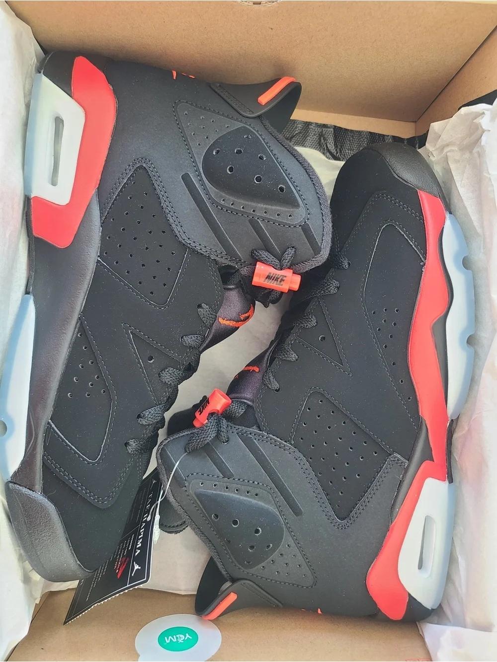 Jordan Kids Black Sneakers with Red Pull Tabs and Multicolor Tongue